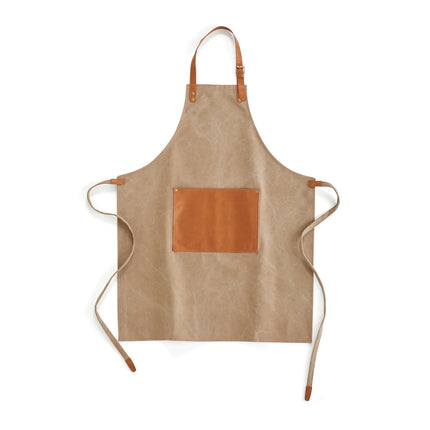 Vinga Stonewashed Canvas Apron Asado for home cooking, durable and stylish, with adjustable neck strap and front pocket.