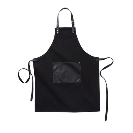 Vinga Casbas Atelier apron for home and living, featuring a stylish fabric design with adjustable straps and front pocket.