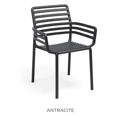 Nardi Doga armchair on a restaurant terrace – stackable Italian polypropylene outdoor chair