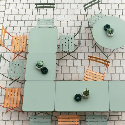 Fermob metal foldable bistro table in honey deep orange