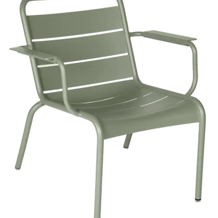 Fermob Luxembourg garden armchair lounge with curved metal frame and cushioned seat