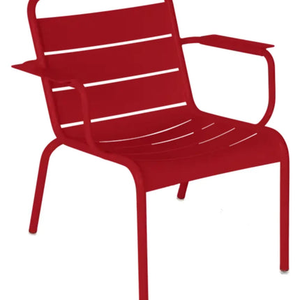 Blue and white Fermob Luxembourg garden armchair lounge with a contemporary design and comfortable seating.