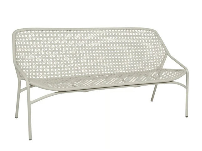 Fermob Croisette outdoor sofa with woven wicker design and plush cushions