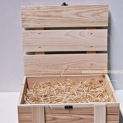 Rustic 3 bottle gift box by Custom Wood Designs with natural wood wool padding for corporate gift packaging.