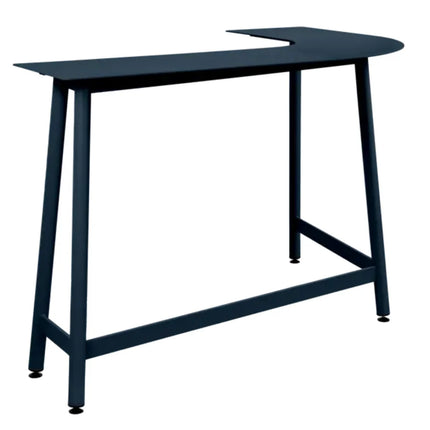 Red ochre Fermob Bolder corner bar stool with two-seater garden bench in foxed metal outdoor furniture setting.
