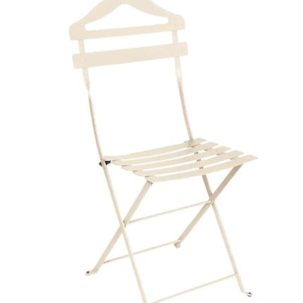  a folding metal chair with a sleek design