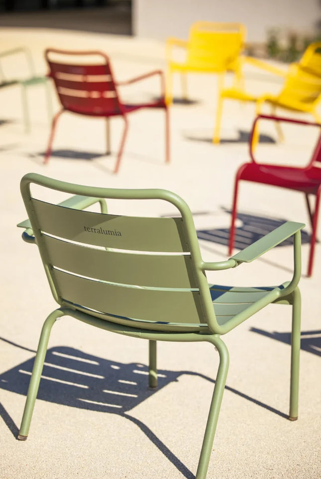 Fermob Luxembourg garden armchair lounge with a woven seat and metal frame