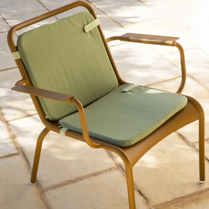 Fermob Luxembourg garden armchair lounge with curved armrests and woven-style seating
