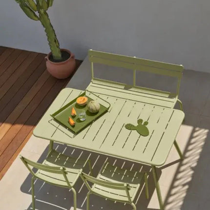  featuring a curved seat and backrest in vibrant outdoor furniture style.