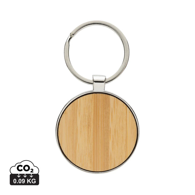 Recycled zinc alloy round keychain with bamboo accents from XD Collection