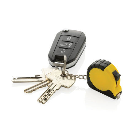  durable measuring tape attached to a keychain.