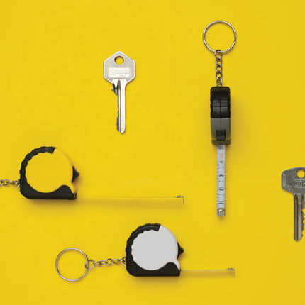 XD Collection MeasureMate RCS recycled ABS 1-meter tape keychain featuring a compact