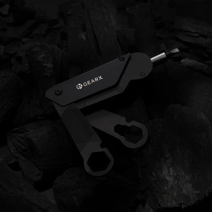  featuring compact multi-tool with various wrench and screwdriver heads.