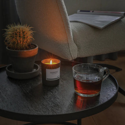 Small scented candle in glass from Ukiyo