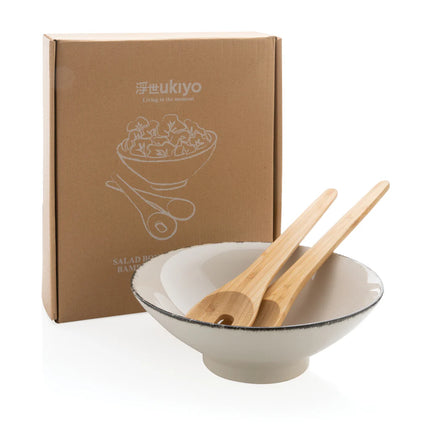  natural wood utensils for serving and tossing.