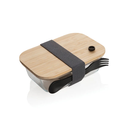  showcasing a clear container with a natural bamboo top for storage.