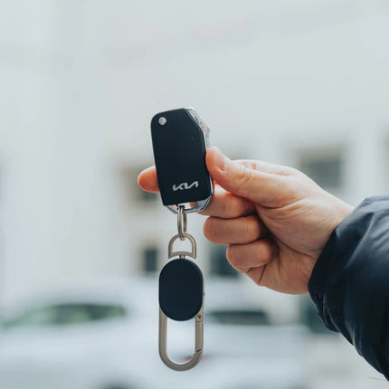  shown with attached keys and keyring.