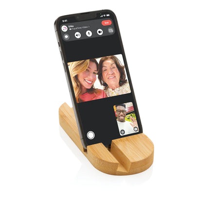  eco-friendly stand for devices on a wooden surface.