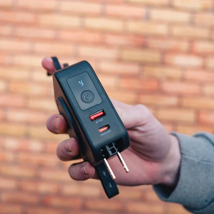 Urban Vitamin Saratoga 5-in-1 universal charger for phones and tablets with multiple charging ports and sleek design.