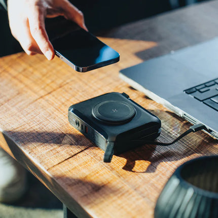 Urban Vitamin Oxnard 5-in-1 65W universal charger for phones and tablets with multiple ports and compact design.