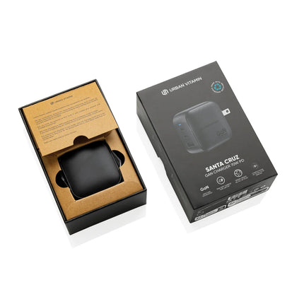  showing a sleek black plastic design with USB ports.