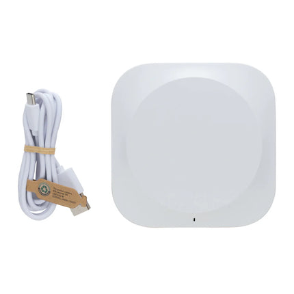 XD Xclusive Oregon RCS recycled plastic and cork 10W wireless phone and tablet charging pad on a desk