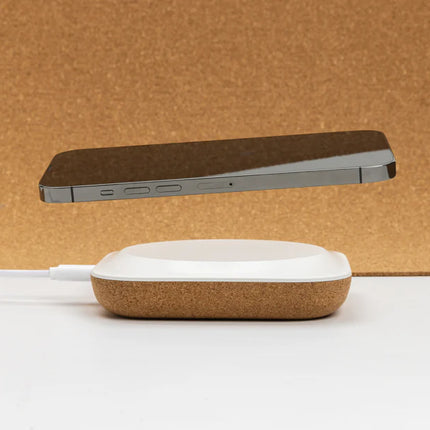 XD Xclusive Oregon RCS recycled plastic and cork 10W wireless phone and tablet charger with eco-friendly design and sleek finish.