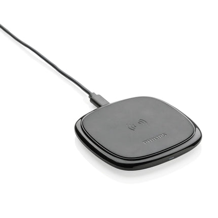  sleek black accessory with charging pad and indicator light.