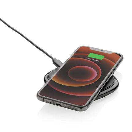 Philips 10W Qi wireless charger for phones and tablets with sleek black design and charging indicator light.