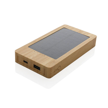 000mAh bamboo solar powerbank from XD Collection with USB ports for charging phones and tablets outdoors.
