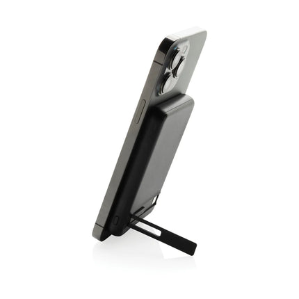  showcasing its compact design and magnetic feature.