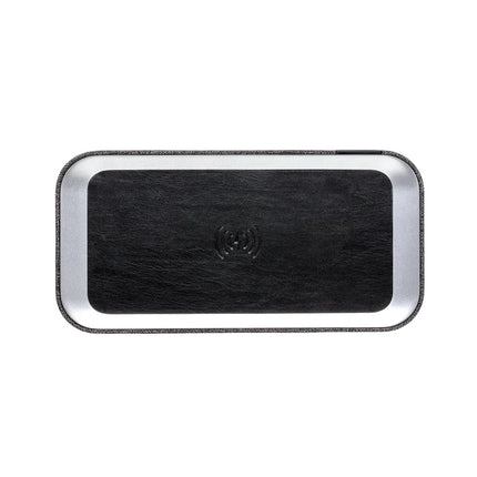  sleek portable audio device with built-in charging pad
