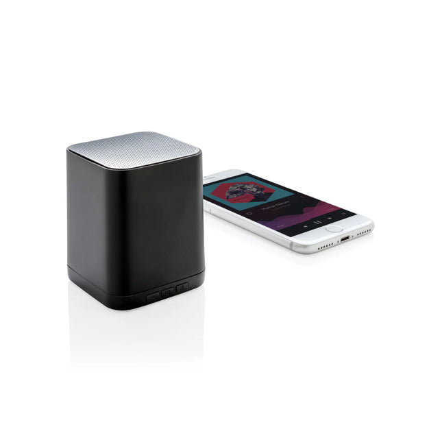  compact audio device with glowing branding and modern design.