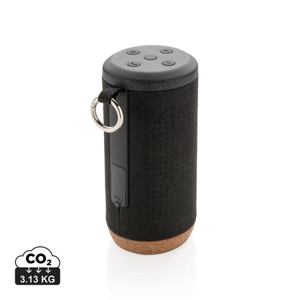 XD Xclusive Baia 10W wireless cork speaker showing a sleek cylindrical design with control buttons on top.
