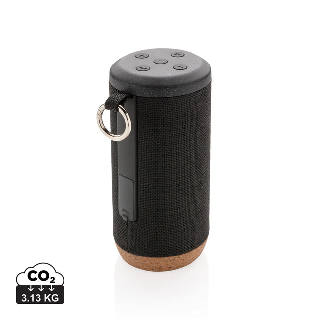 XD Xclusive Baia 10W wireless cork speaker showing a sleek cylindrical design with control buttons on top.