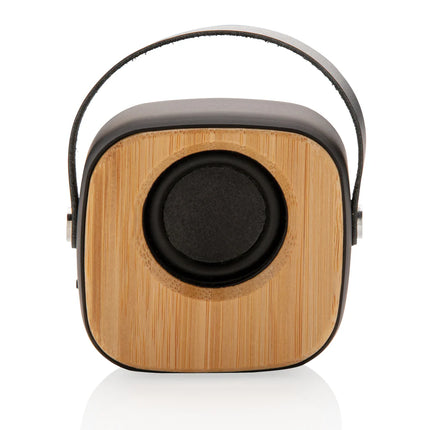  compact audio device with bamboo finish and built-in speaker grille.