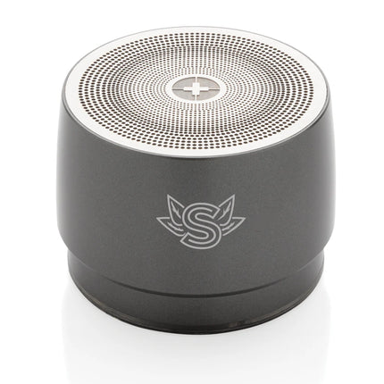  compact portable audio device with control buttons and speaker grille.