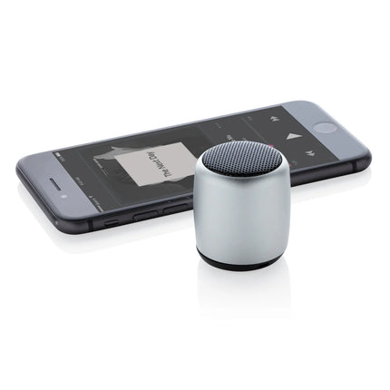  compact portable audio device with sleek aluminium design and built-in Bluetooth.