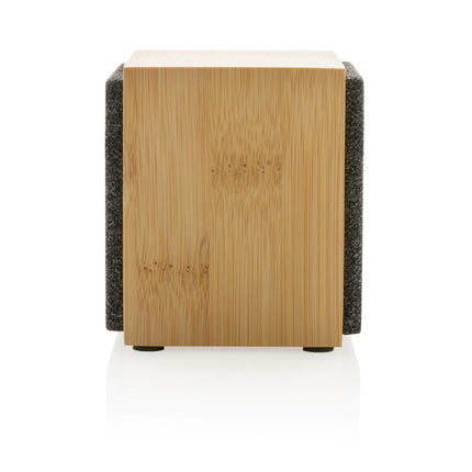  compact audio device with bamboo finish and built-in controls.