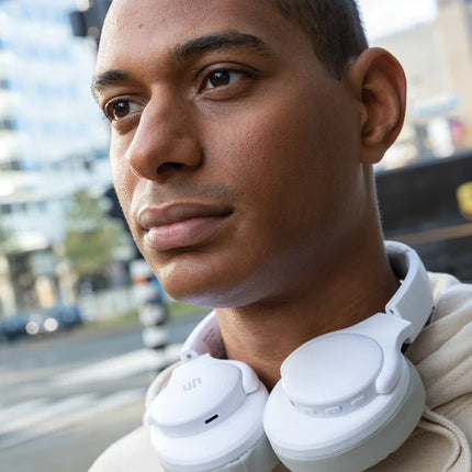  black over-ear audio headphones with cushioned ear cups and adjustable headband.