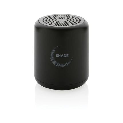  compact audio device with black finish and textured surface.