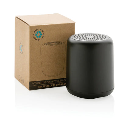  portable audio device with fabric-covered design and control buttons.