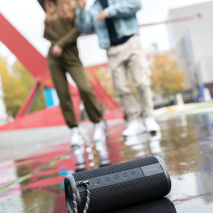 Urban Vitamin IPX7 waterproof 10W portable speaker with sleek black design and buttons for easy control.