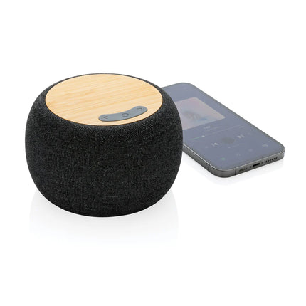  and bamboo 5W audio speaker showing the eco-friendly design and compact size.