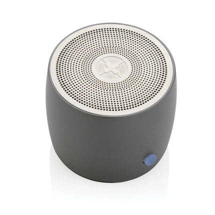 Swiss Peak RCS recycled aluminum 3W bass speaker showing its sleek design and compact size for portable audio use.