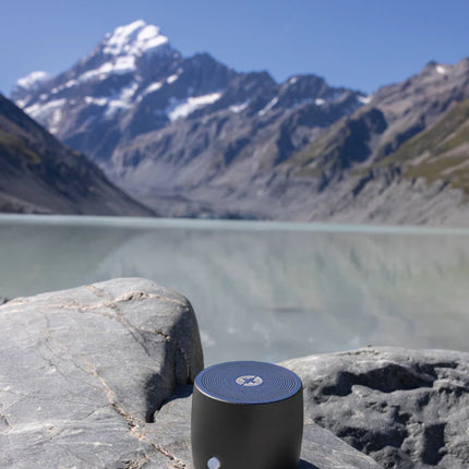  compact portable audio device with sleek design and durable aluminum build.