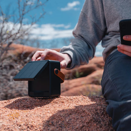  12W portable audio device with solar panel and eco-friendly design.