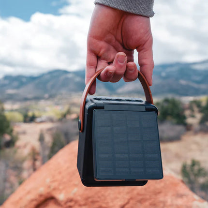  12W portable audio device with built-in solar panel and durable design