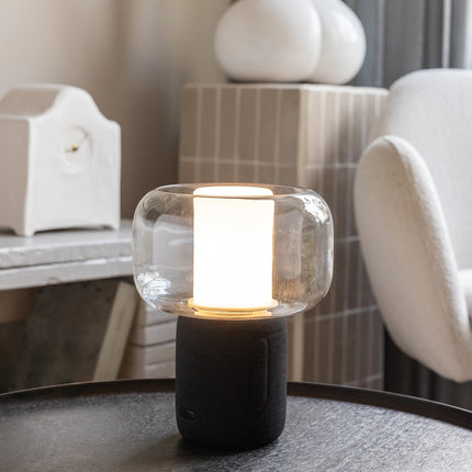  modern design with integrated speaker and lighting features.