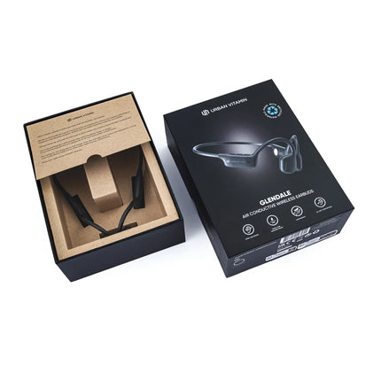 Urban Vitamin RCS plastic air conductive headphones showing sleek black design with adjustable headband.
